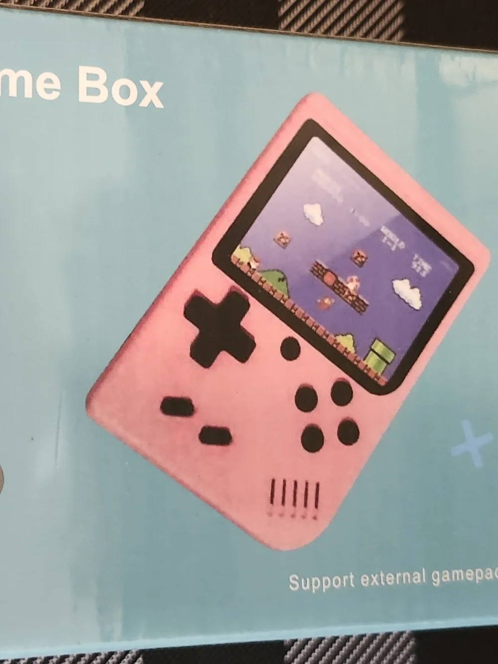 Portable Pink Retro Handheld Gaming Console with D-Pad and Action Buttons